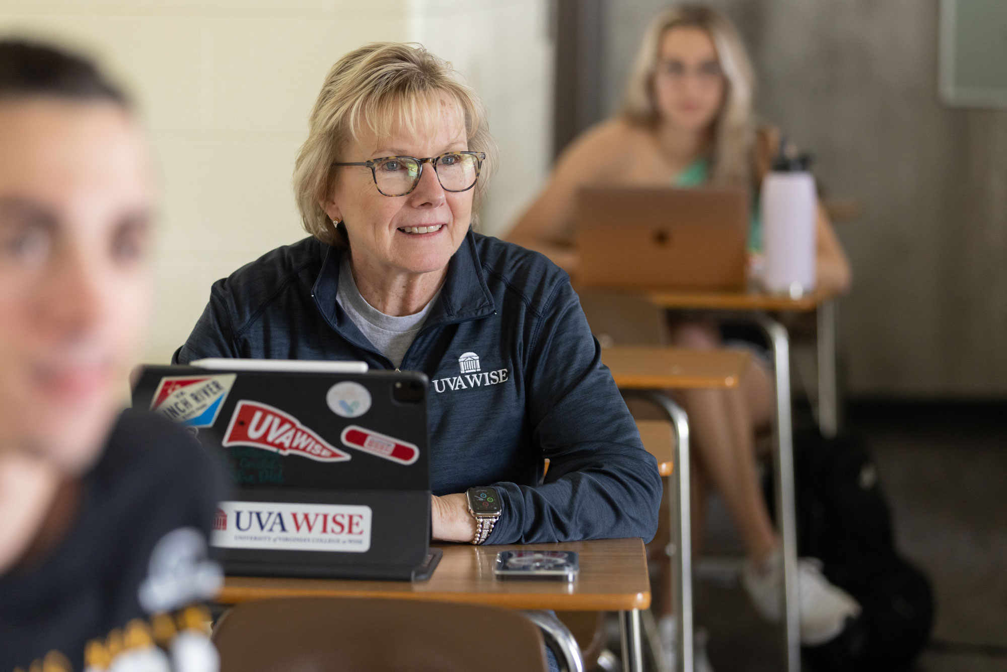 Chancellor Henry at classroom desk