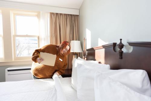 Student during room checks at Inn