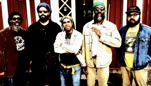 The Corey Harris Band poses for a photo opp. 