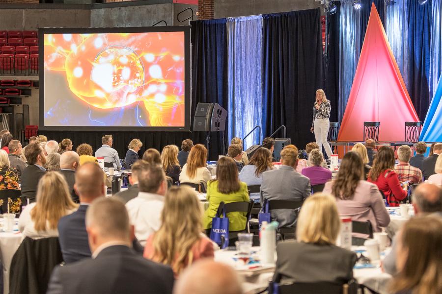 Woman presenting at conference