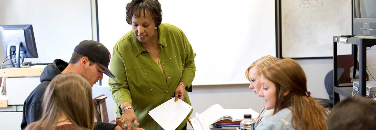 Professor in class with students