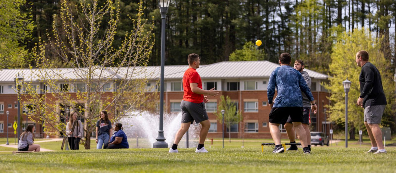 Students playing games on the lawn