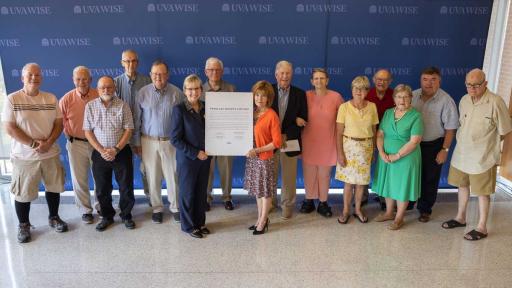 Twinleaf members with Chancellor Henry