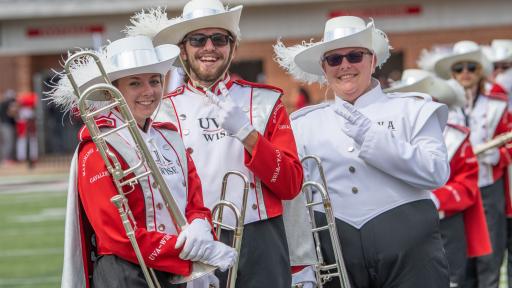 Marching Band members pose at Homecoming 2021